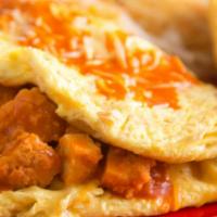 Buffalo Chicken Omelet · Stuffed with spicy buffalo chicken, Cheddar Jack cheese.