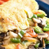 Vegetable Garden Omelet · Lite omelets made with egg whites. Fresh tomatoes, onions, green peppers, and mushrooms.