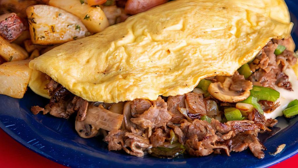 Steak Bomb Omelet · Shaved steak, peppers, onions, mushrooms and American cheese