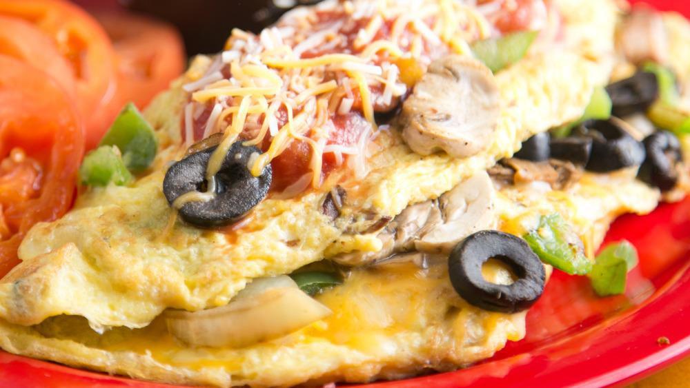 Spanish Omelet · Spicy. Salsa, olives, mushrooms, onions, peppers, and Cheddar cheese.