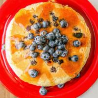 Blueberry · 3 Loaded blueberry buttermilk pancakes.