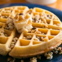 Maple Walnut Waffle · Loaded with chopped walnuts and topped with maple butter.