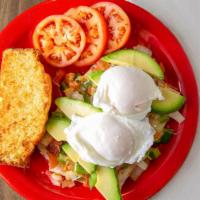 Classic Huevos Rancheros · Ernest Hemingway's favorite. Two dropped eggs on a tortilla with salsa, peppers, tomato, avo...