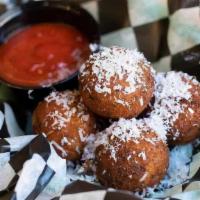 Risotto  Balls · Lightly fried. Served with marinara.