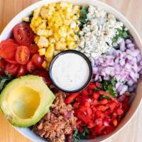 Christopher · Shredded kale, roasted corn, avocado, cherry tomatoes, red pepper, red onion, bacon, and gor...
