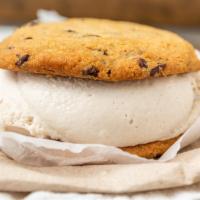 Vanilla Bean Ice Cream Cookie Sandwich · home made chocolate chip cookies and vanilla ice cream.
All natural, vegan.
*contains soy an...