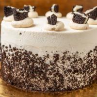 Cookies & Cream Ice Cream Cake · Hand made ice cream cake.
Cookies and cream ice cream and a layer of crushed cookie in the c...