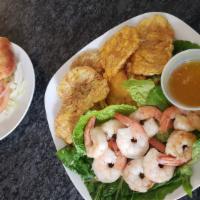 Shrimp With Garlic Sauce · With fried plantain, salad, and garlic bread.