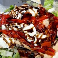 Caprese Salad · Chicken breast, fresh mozzarella, romaine lettuce, tomatoes, olives, roasted peppers, balsam...