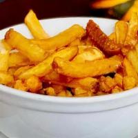 Papas Fritas. · Freshly cut potatoes fries