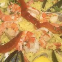 Paella Marinera For 2. · Spanish Sea Food Paella. saffron rice - clams - mussels - calamari - shrimp
