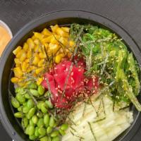 Tuna Poke Bowl · Sushi rice, fresh tuna, corn, seaweed salad, cucumber, edamame, nori, scallion, sesame, spic...