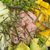 Yellowtail Poke Bowl · Sushi rice, fresh yellowtail avocado, cucumber, mango, edamame, nori, scallion, spicy mayo a...
