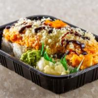 Volcano Roll · Spicy tuna inside, baked scallop and crab stick on top with tempura flake spicy mayo tobiko ...