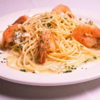 Shrimp Scampi · Large Gulf Shrimp sautéed in garlic, butter, white wine and tossed with imported spaghetti