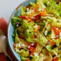 Chef Salad · House salad with ham, turkey, roast beef and American cheese.