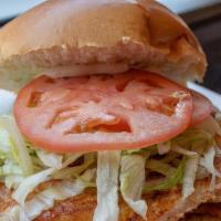 Spicy Grilled Chicken Sandwich · Lettuce, tomato, onion.