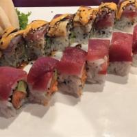 Sushi & Sashimi Combination · Contains raw fish. 4 pcs of sushi, 8 pcs of assorted sashimi and California roll.