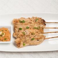 Chicken Satay (4) · (Grilled chicken on stick) Served with Thai peanut sauce.
