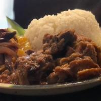Nasi Lemak · Combination. Coconut rice flavored with cloves served with chili anchovy, curry chicken and ...