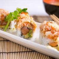 Umai Maki (8 Pieces) · Served raw. Shrimp, tobiko, avocado, cucumber topped with a layer of crunchy spicy tuna.