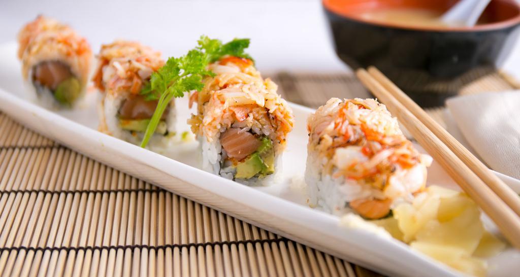 Umai Maki (8 Pieces) · Served raw. Shrimp, tobiko, avocado, cucumber topped with a layer of crunchy spicy tuna.