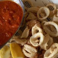 Calamari  · Fried calamari served with tomato sauce.