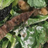Steak · Field greens, sliced tenderloin, walnuts, chick peas, pear, dried cherries served with a whi...