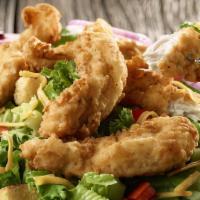 Chicken Fingers Salad · Tender chicken fingers over a house salad with garlic knots & your choice of dressing  on th...