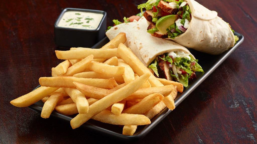 Tuna Wrap · Fresh homemade Tuna salad, American cheese, lettuce, tomato. Served in a whole wheat wrap  with french fries.