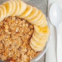 Peanutty Acai Bowl · Acai blended with peanut butter, almond milk. Topped with granola, banana and honey.
