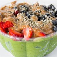 Healthnut Bowl · Topped with almonds, strawberry, blueberry, hemp hearts and almond butter.