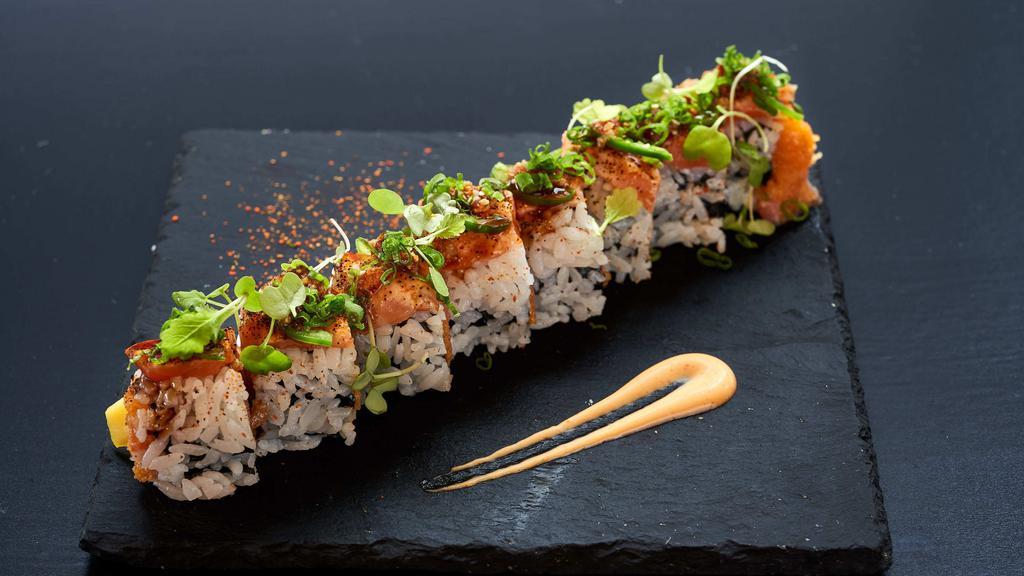  Sakana Roll · Inside: spicy tuna, mango. Outside: seared salmon, jalapeño, scallion. Sauce: crunchy sesame soy, soy glaze.

Consuming raw or undercooked meats, poultry, seafood, shellfish, or eggs may increase your risk of foodborne illness, especially if you have certain medical conditions.