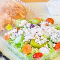 Greek Salad · Lettuce,Cucumbers,Tomatoes,Green Peppers,Pepperocini,Olives,Carrots and Radish with Feta Che...
