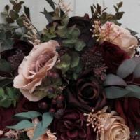 Goddom · Deep burgundy arrangement.The 'Godessa' bouquet is a blend of wild flowers, romantic roses a...