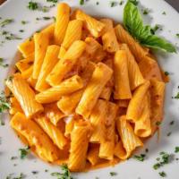 Vodka Rigatoni Dinner · In our famous vodka sauce (creamy and tasty).