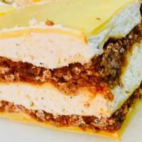 Lasagna Dinner · Ground beef, ricotta and melted mozzarella cheese.