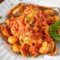 Frutti Di Mare Dinner · Shrimp. Scallops, clams, mussels and calamari in a delicious marinara sauce over linguini.