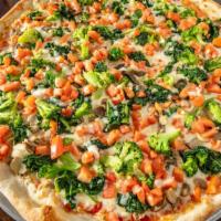 Pan Veggie Spring Garden Pizza · Mushroom, spinach, broccoli, fresh tomatoes and fresh garlic.