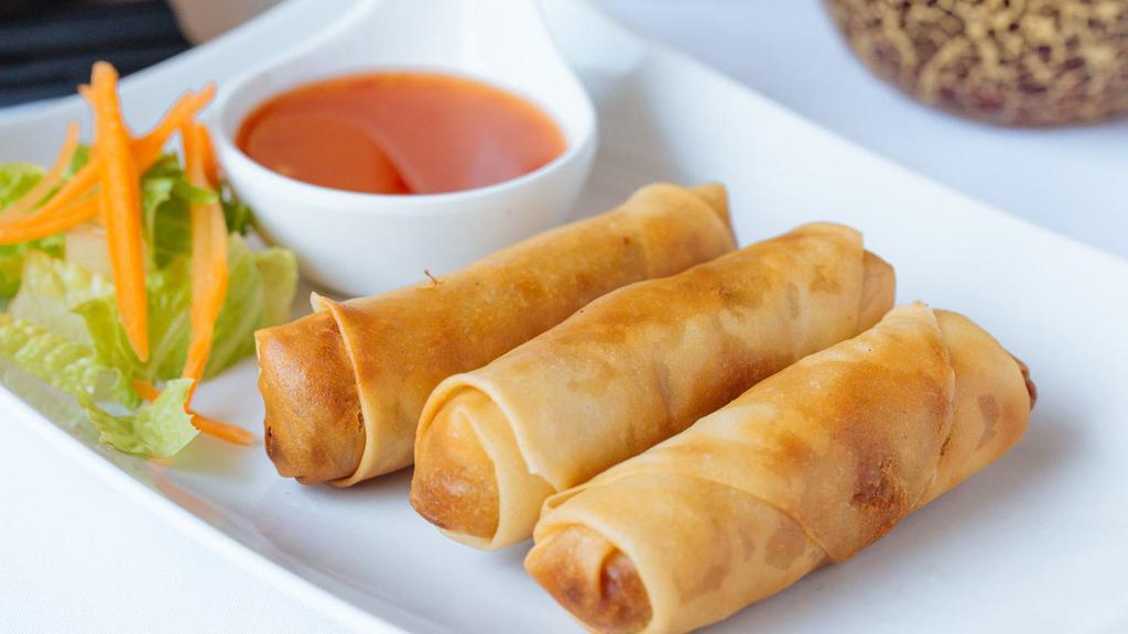 Thai Spring Rolls (3) · Crispy fried vegetable rolls served with sweet chili sauce.