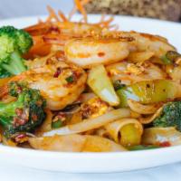 Pad Key Mao (Drunken Noodle) · Flat rice noodle stir fried in spicy basil sauce with egg, broccoli, onion, bell pepper, tom...