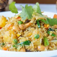 Basil Fried Rice · Fried rice with egg, bell pepper, onion and Thai basil in spicy sauce.