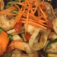Phuket Seafood · Sautéed shrimp, scallop, squid, mussel, onion, scallion, bell pepper, celery, pineapple and ...