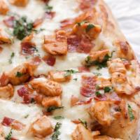 Bbq Chicken Pizza · Special BBQ sauce loaded with grilled marinated chicken breast, fresh red onions and topped ...