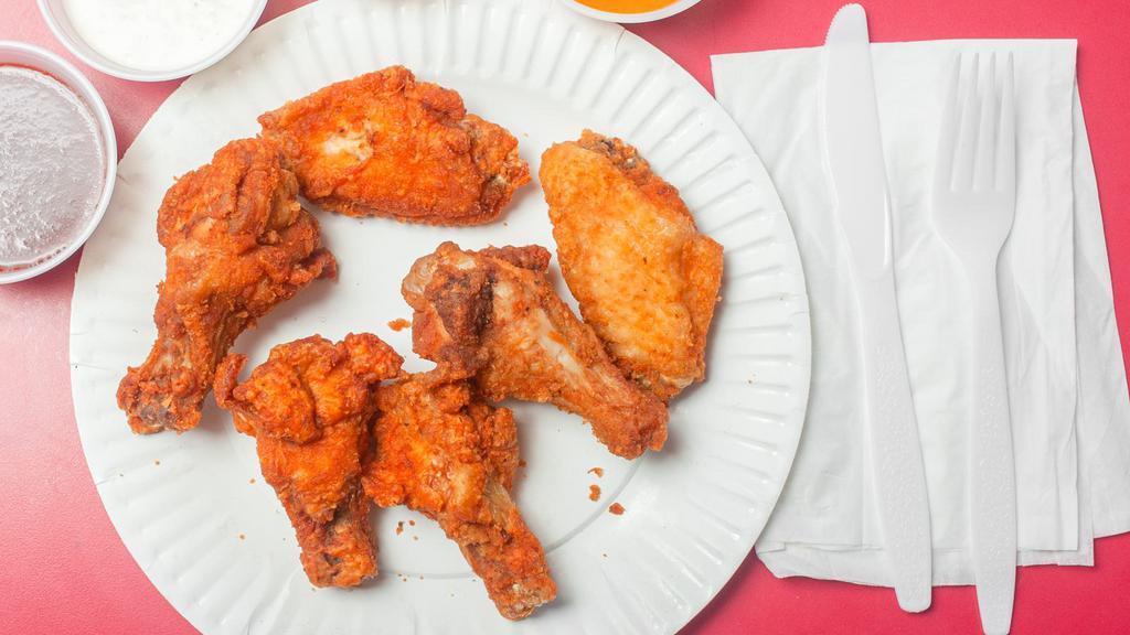 Regular Wings · Most popular. Served with your choice of blue cheese or ranch dressing.