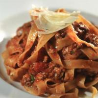 Bolognese · Braised Veal, Beef, Pork, Tomato Sauce.