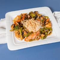 Chicken Stir-Fry · Sautéed chicken breast with stir-fry vegetables served with over rice.