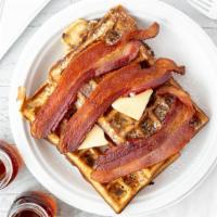 Maple Bacon Waffles · Two waffles baked with brown sugar-filled with candied bacon and topped with three scrumptio...