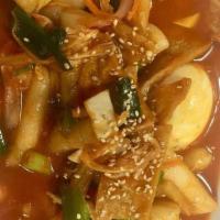 Topokki · Stir-fried with rice cake with vegetables and fish cake in a spicy sauce.