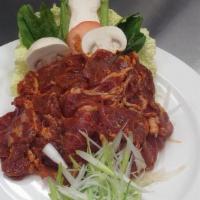 Spicy Pork Loin · Spicy. Pork tenderloin thinly sliced and marinated with a spicy hot blend of red pepper past...